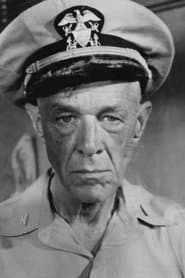 Russ Brown as Capt. J.M. Brackett, USN