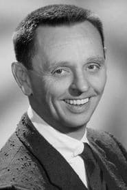 Knox Manning as Radio Interviewer Cardigan