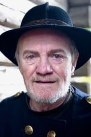 Jonathan Hutchings as Greene