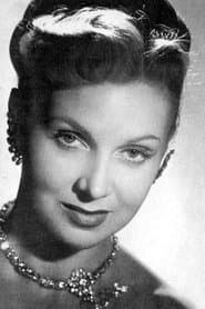 Simone Paris as The Madame