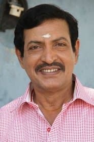 Nizhalgal Ravi as Radhika's father
