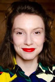 Marion Reymond as Adrienne