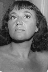 Luz del Fuego as Snake dancer