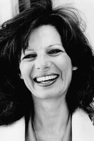 Micki Moore as T.V. Reporter