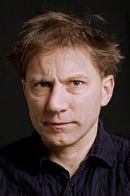 Simon McBurney as Magician