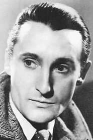 Robert Le Vigan as Mr. Lheureux, fabric merchant