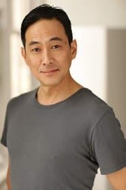 Paul Juhn as Cop #1