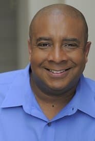 Greg Clarkson as News Anchor