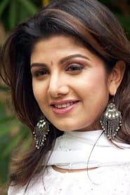 Rambha as Meenakshi Parthasarathy