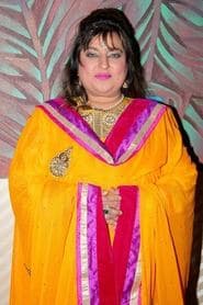 Dolly Bindra as Pitambar Jalan's Wife