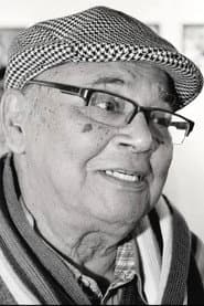 Manoj Mitra as Headmaster