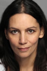 Sasha Behar as The Bomber's Wife