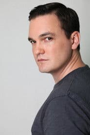 Chris Buckley as Police Officer