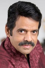 Balachandra Menon as Krishnamoorthy
