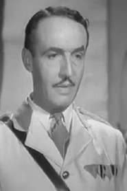 Cecil Ramage as Crown Counsel