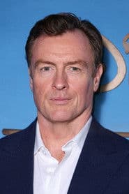 Toby Stephens as Riley