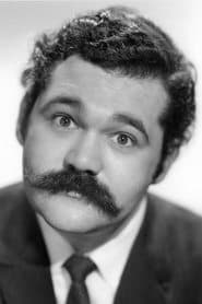 Avery Schreiber as Frank Baxter