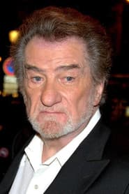 Eddy Mitchell as Raymond Monnet