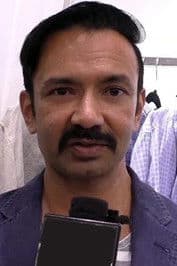 Vincent Asokan as Mahalakshmi's father