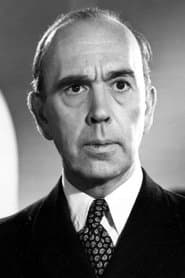 Ronald Adam as Talkative, balding club member