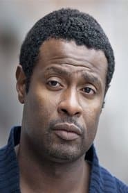 John Williams as Doctor Chris van Weveren