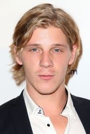 Daniel Webber as Kenny