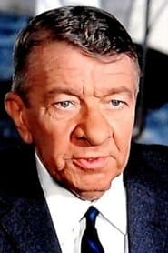 Robert Dalban as L'entraîneur