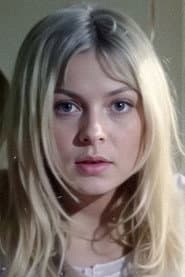 Anna Gladysek as Janine, a prostitute