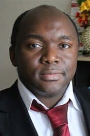 Alain Dzukam Simo as Rokko