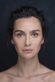Birce Akalay as The wife of Cpt. Mete