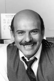 René Enríquez as Max Ortiz, Holland's contact in Nicaragua