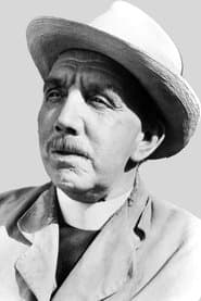 George Relph as Vicar Sam Weech