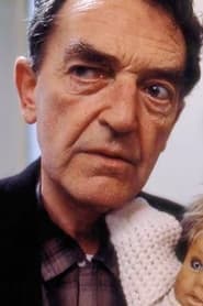 Tom Watson as Minister