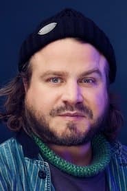 Brady Corbet as The American