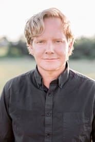 Jonathan Torrens as Jim Macmichael