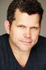 John Batchelor as Mal Logan