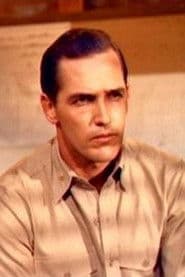 Floyd Simmons as Commander Harbison, USN