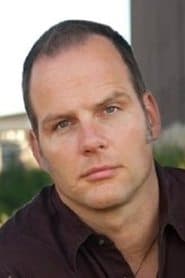 Adrian G. Griffiths as Tom Ackhurst