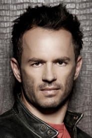 Greg Ellis as Captain Boomerang (voice)