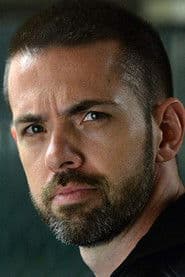 Matt Clouston as Talk Show Host Martin Edwards