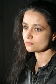 Ioana Ana Macaria as The journalist