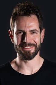 Korel Cezayirli as Teacher Metin