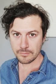 Rory Acton Burnell as Reporter #2