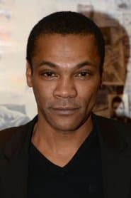 Adama Niane as Le Lieutenant Arsène Njo Léa