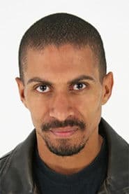 Hein De Vries as Satish Kalpoe