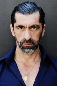 Erdal Yıldız as Abi