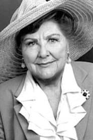 Justine Johnston as Bedding Saleswoman