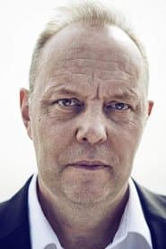 David Schaal as Commander Grayson