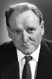Bernard Lee as A.S. 'Stripey' Wood
