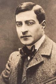 Max Dearly as Homais, pharmacist